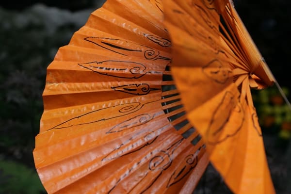 Flower Festival Girona (51) Orange Fans in Girona's Flower Festival