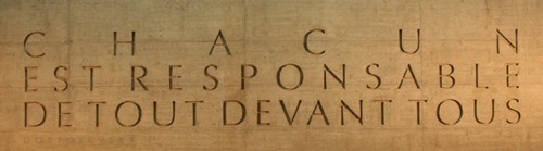 Chacun est responsable de tout devant tous - Everyone is responsible to everyone for everthing. Motto in stone of the Red Cross & Crescent, Geneva, Swizerland