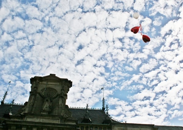 Germany Cologne Rathaus with herat shaped balloons overhead