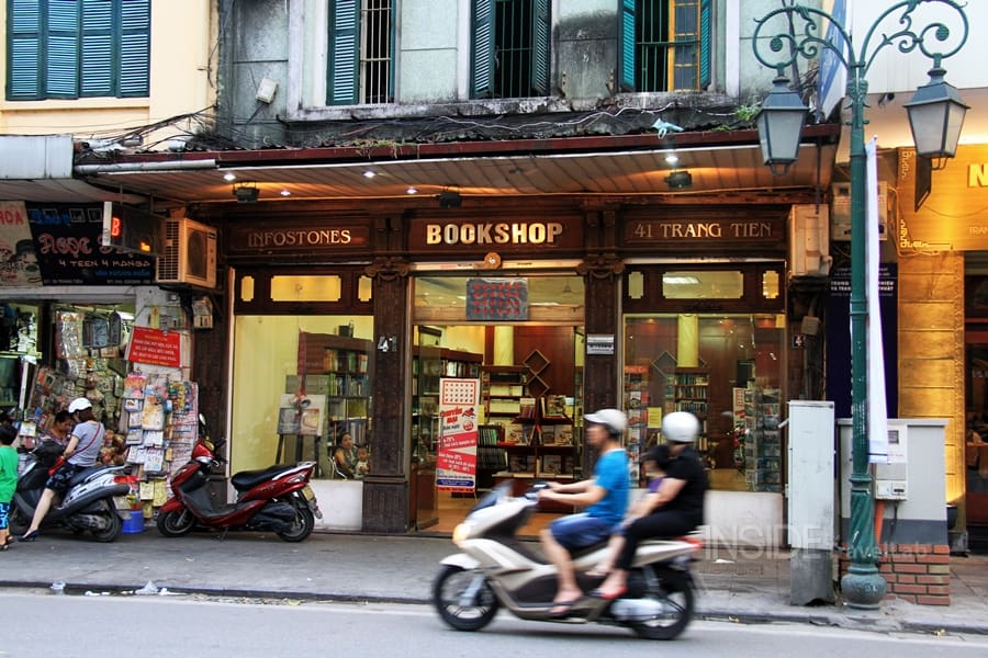 Vietnam Hanoi Fast moving moped in French Quarter