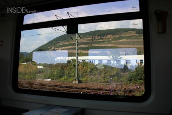 Annoying reflections in glass when trying to take a photo on a train