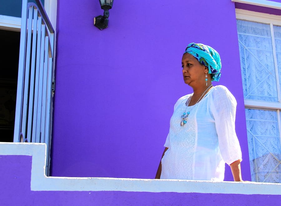 South Africa - Cape Town - Bo Kaap - Woman looking into the street