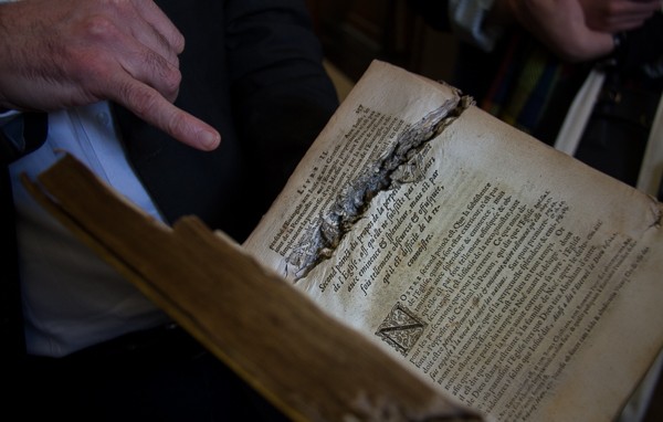 Gunshot wounds in book in Marsh's Library from @insidetravellab