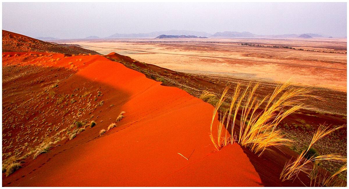 Climbing sand dunes in the Namib desert