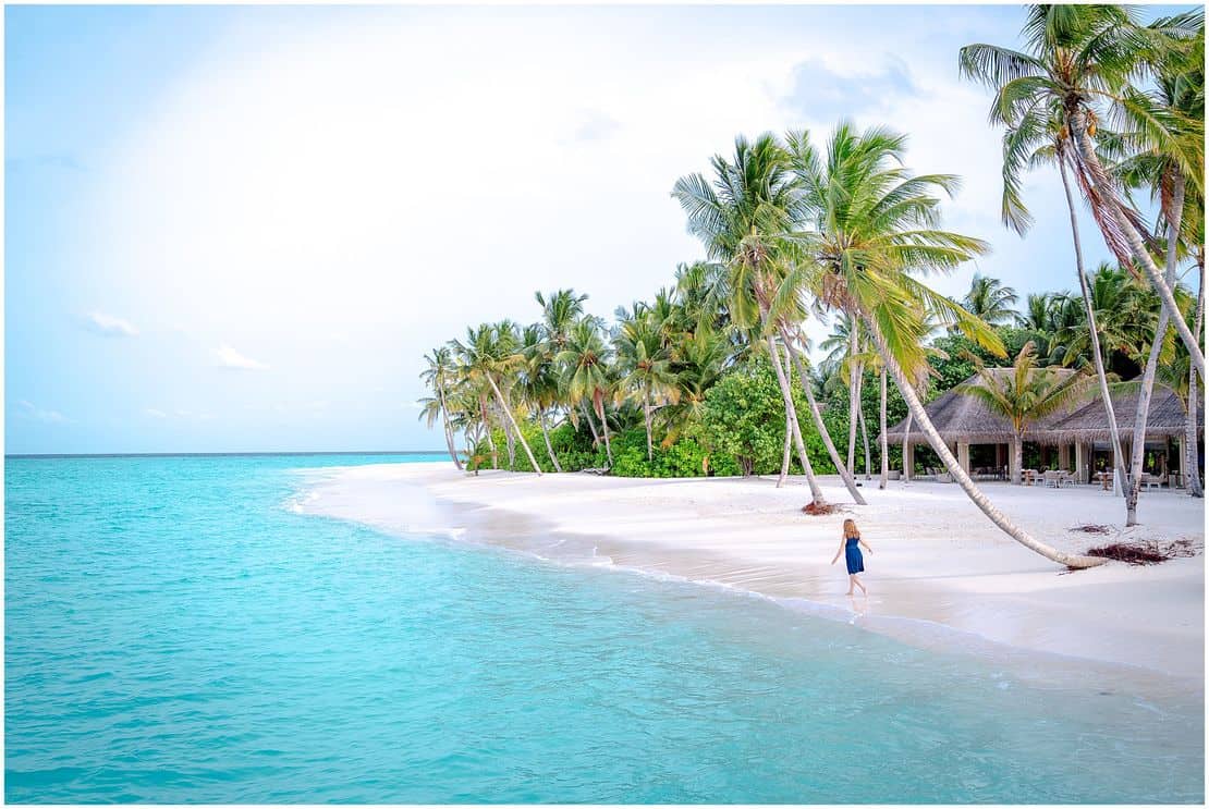 Walking along the beach in the Maldives