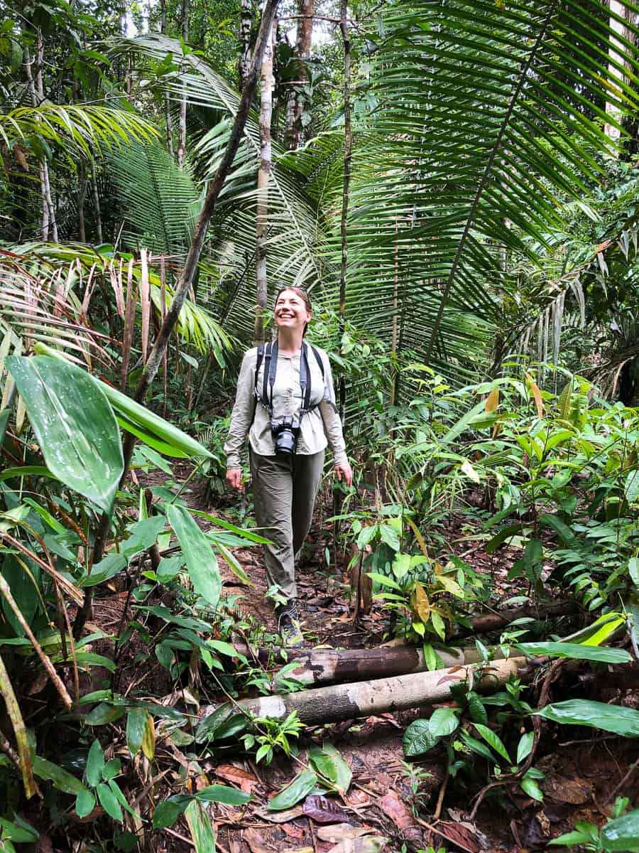 Brazil - Amazonas - Amazon Rainforest - Juma Lodge and Surrounds - Abigail King - woman walking in jungle