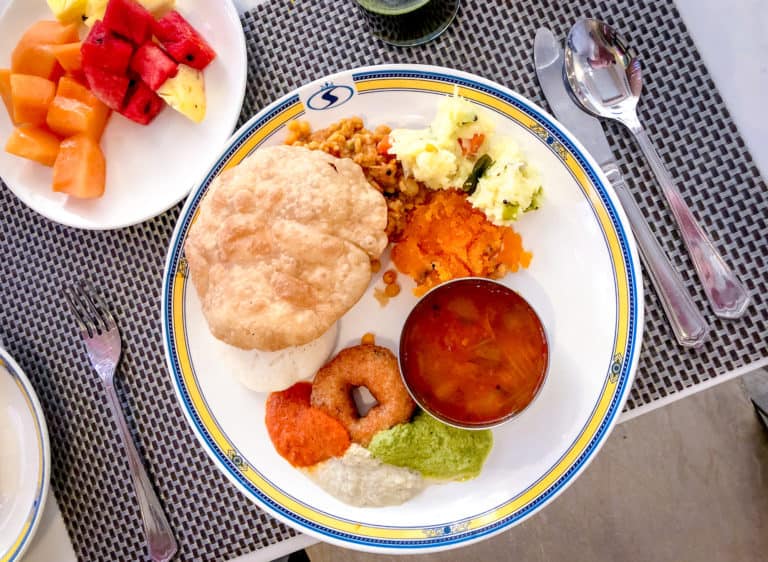 India - Karnataka - Mysore Food - Breakfast mix of puri, idli, vada, chutney, kesari bath and bisibelabath