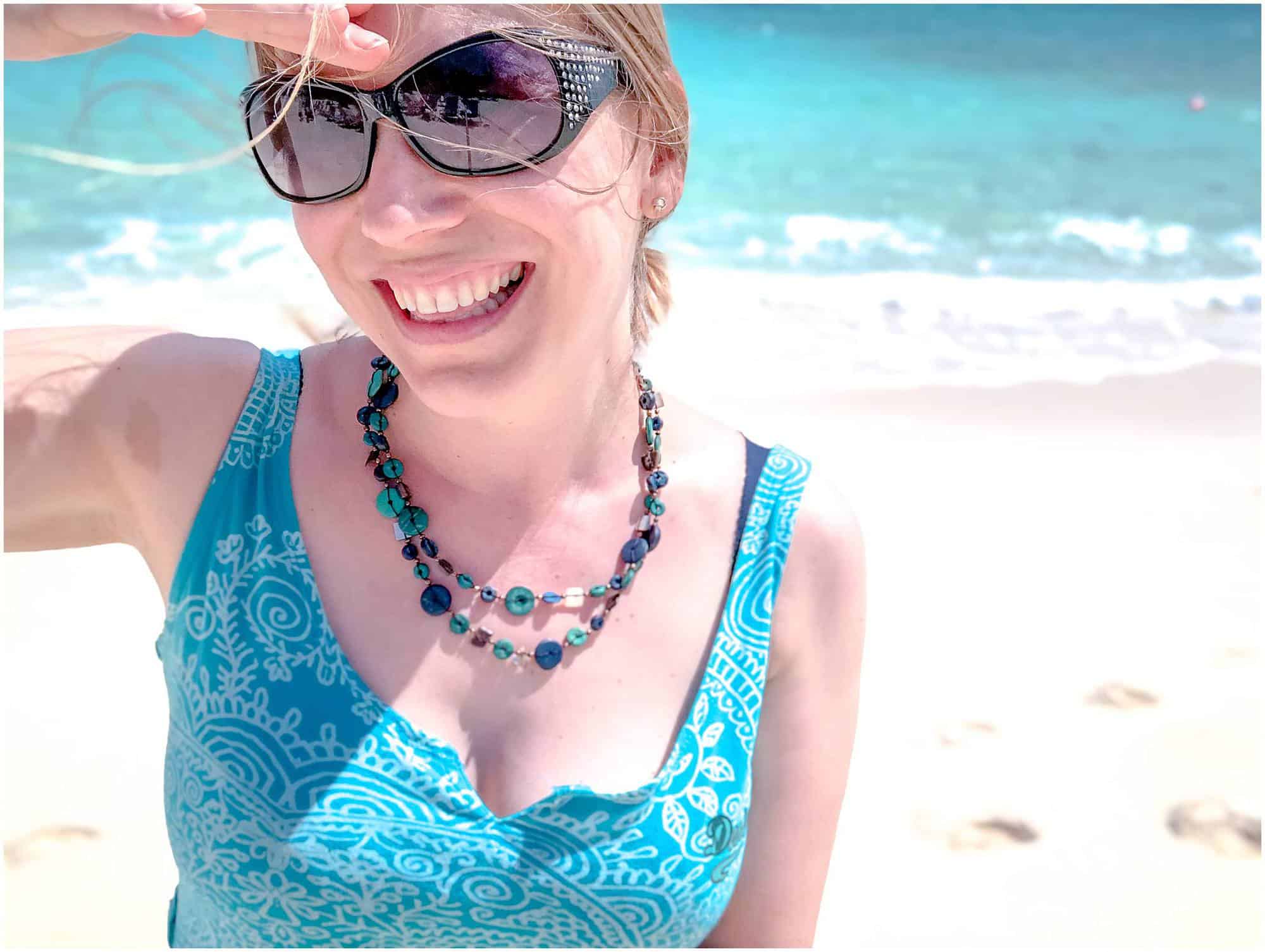 Bahamas - Nassau - Abigail King travel writer on beach