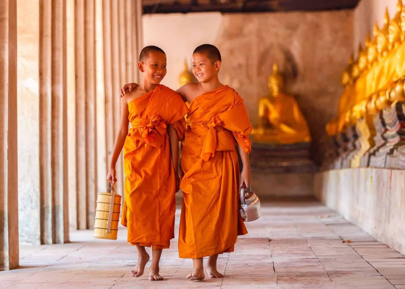 Thailand - Golden Temple - Child Monks Walking arm in arm
