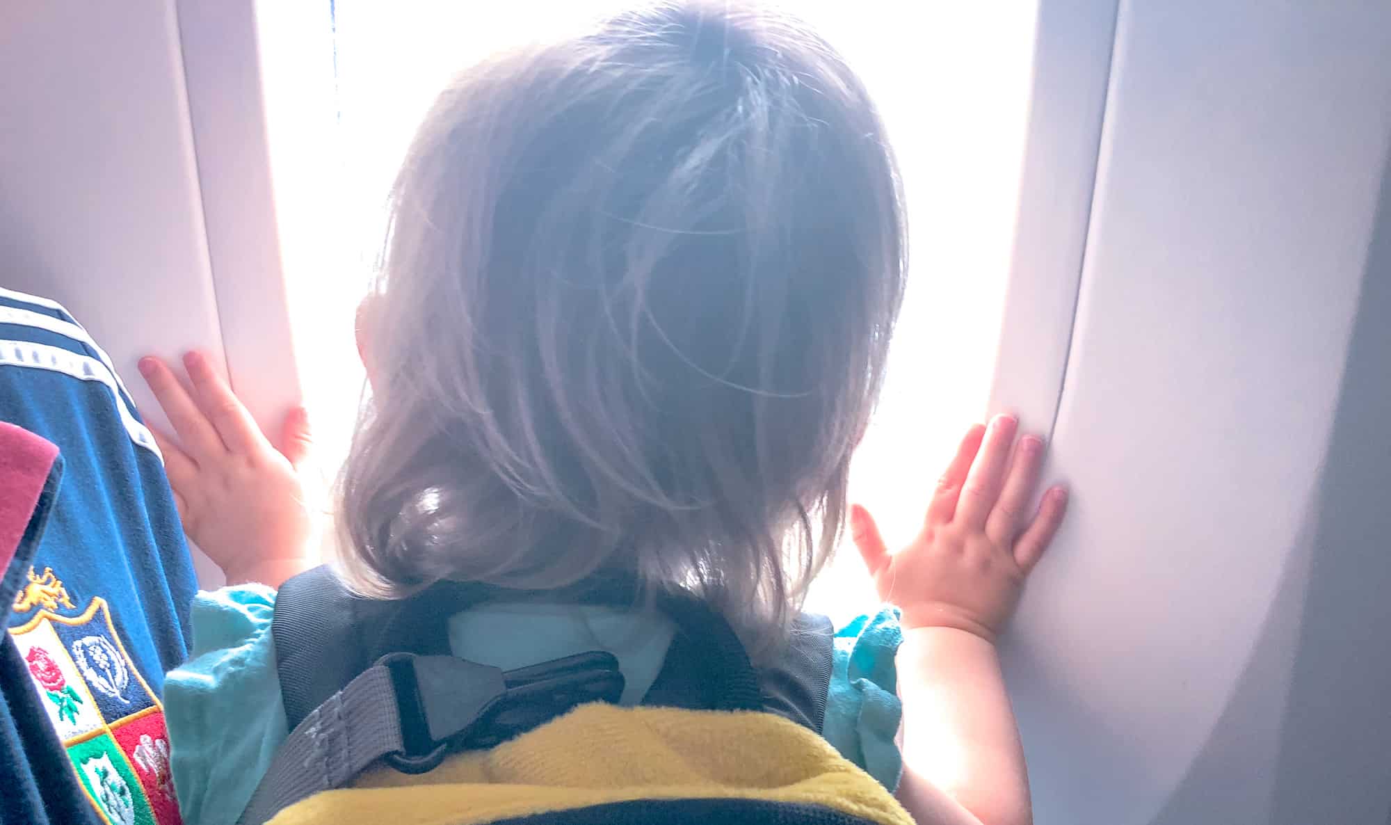 Flying with baby - hands at the window