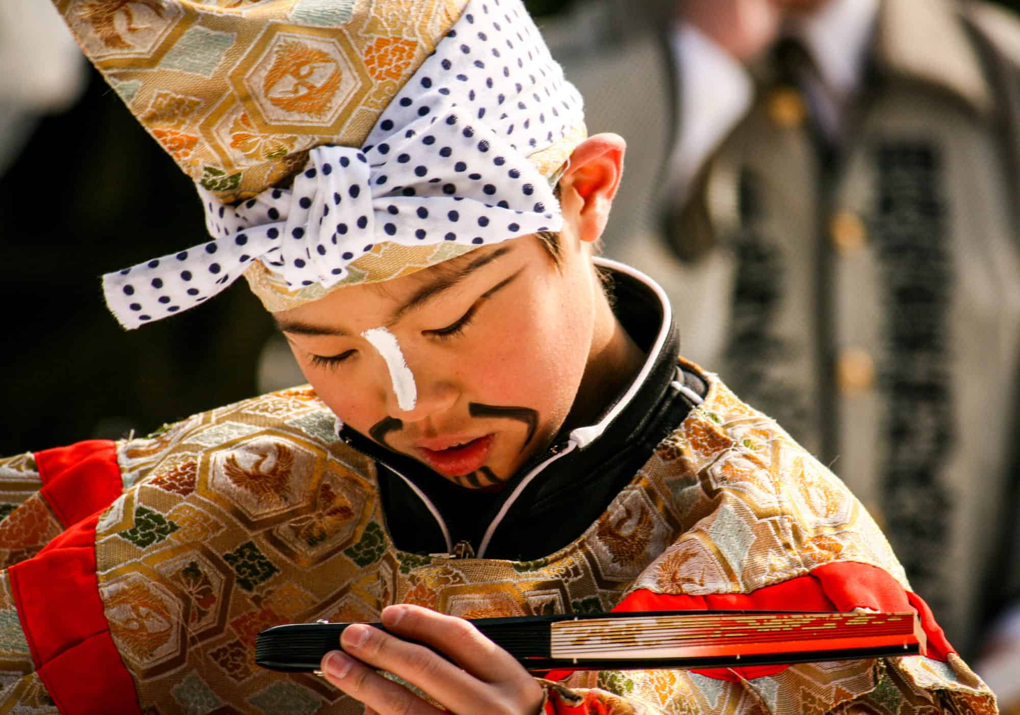 Japan - Tohoku - Aomori - Hachinohe Emburi Festival Dancers and Scenes- child examines musical instrument