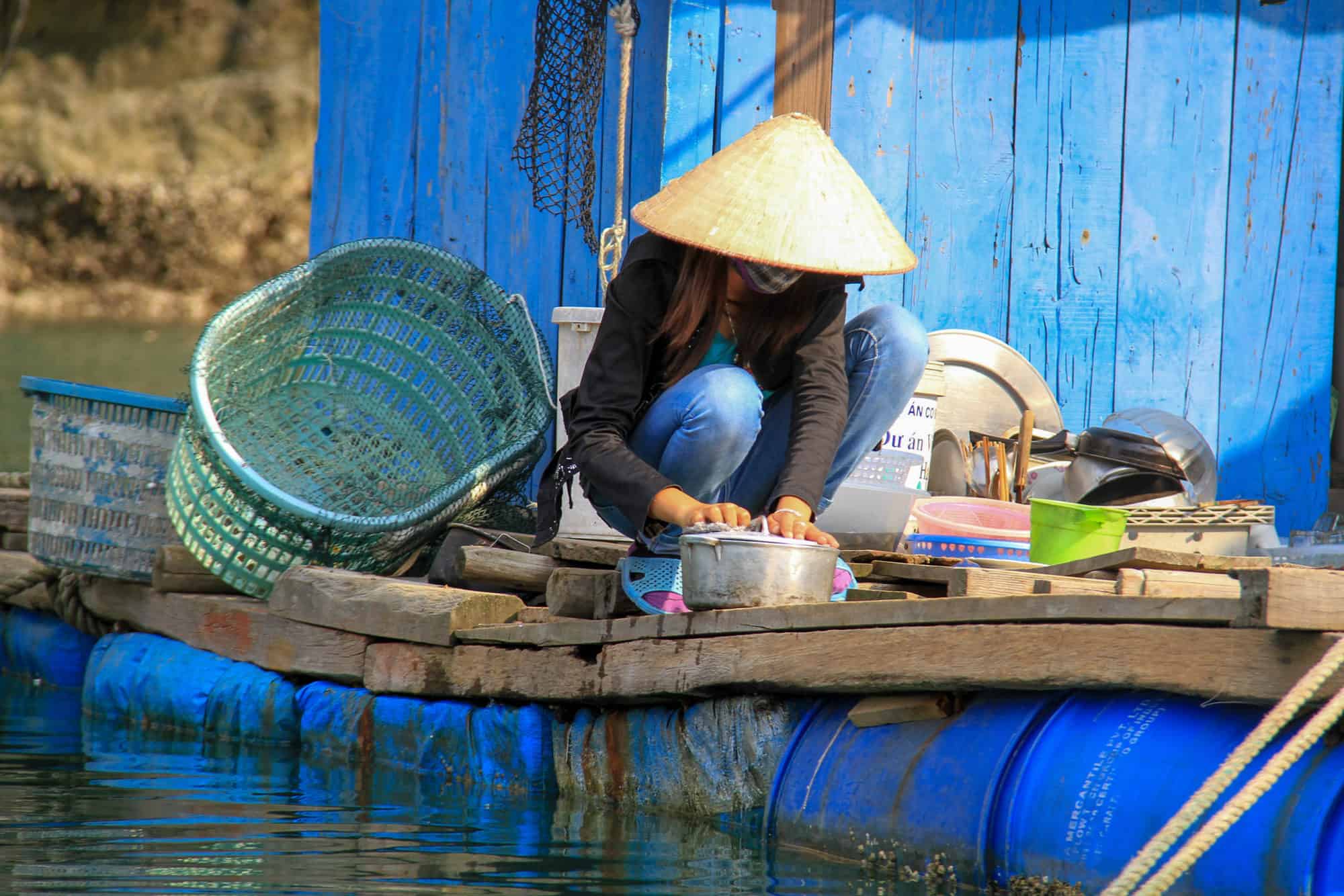 Vietnam - Halong Bay - Vung Vieng Floating Fishing Village Woman Washing Up
