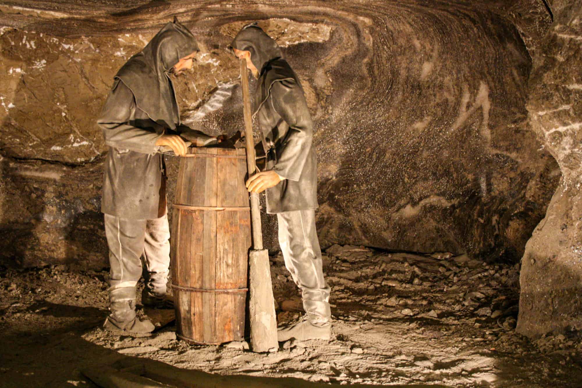 Wieliczka Salt Mine near Krakow - statue of two men working in the salt mine