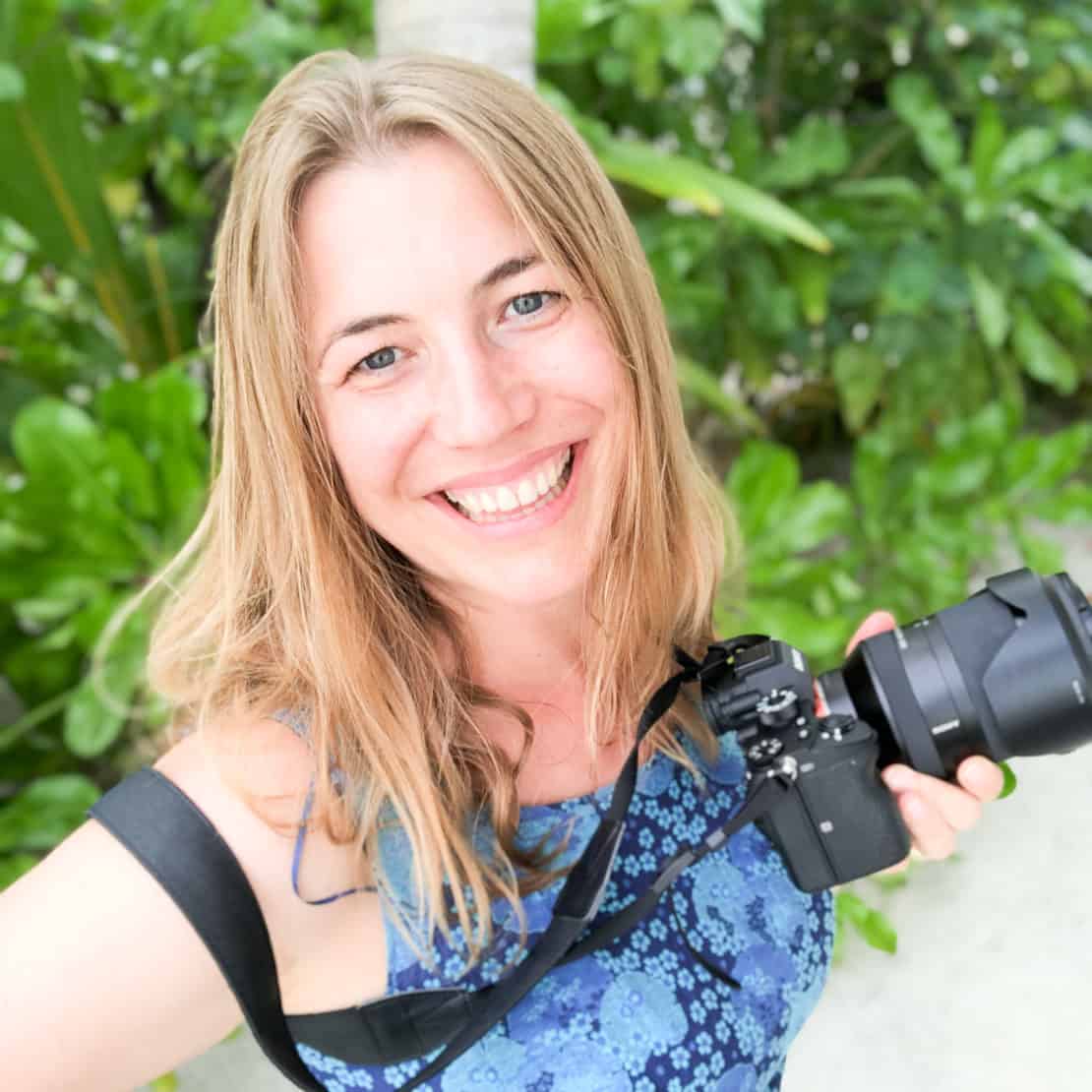 Abigail King with camera - outdoorsy woman gift guide