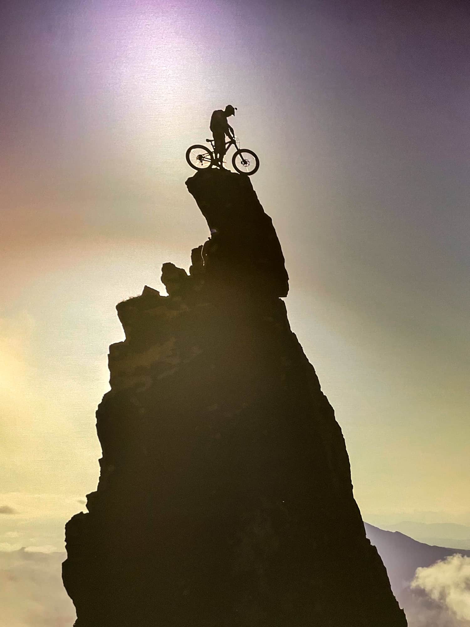 Verbier ebike cyclist on rocky peak