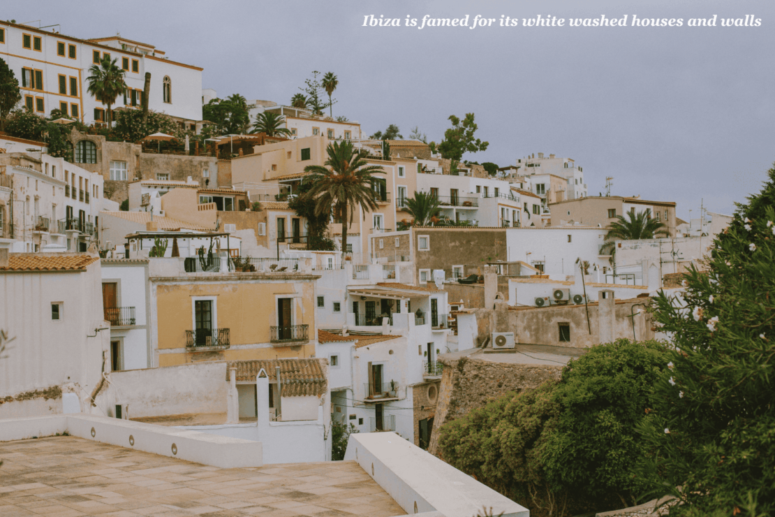White houses and beige shutters on buildings in Ibiza, Spain - interesting facts about Ibiza