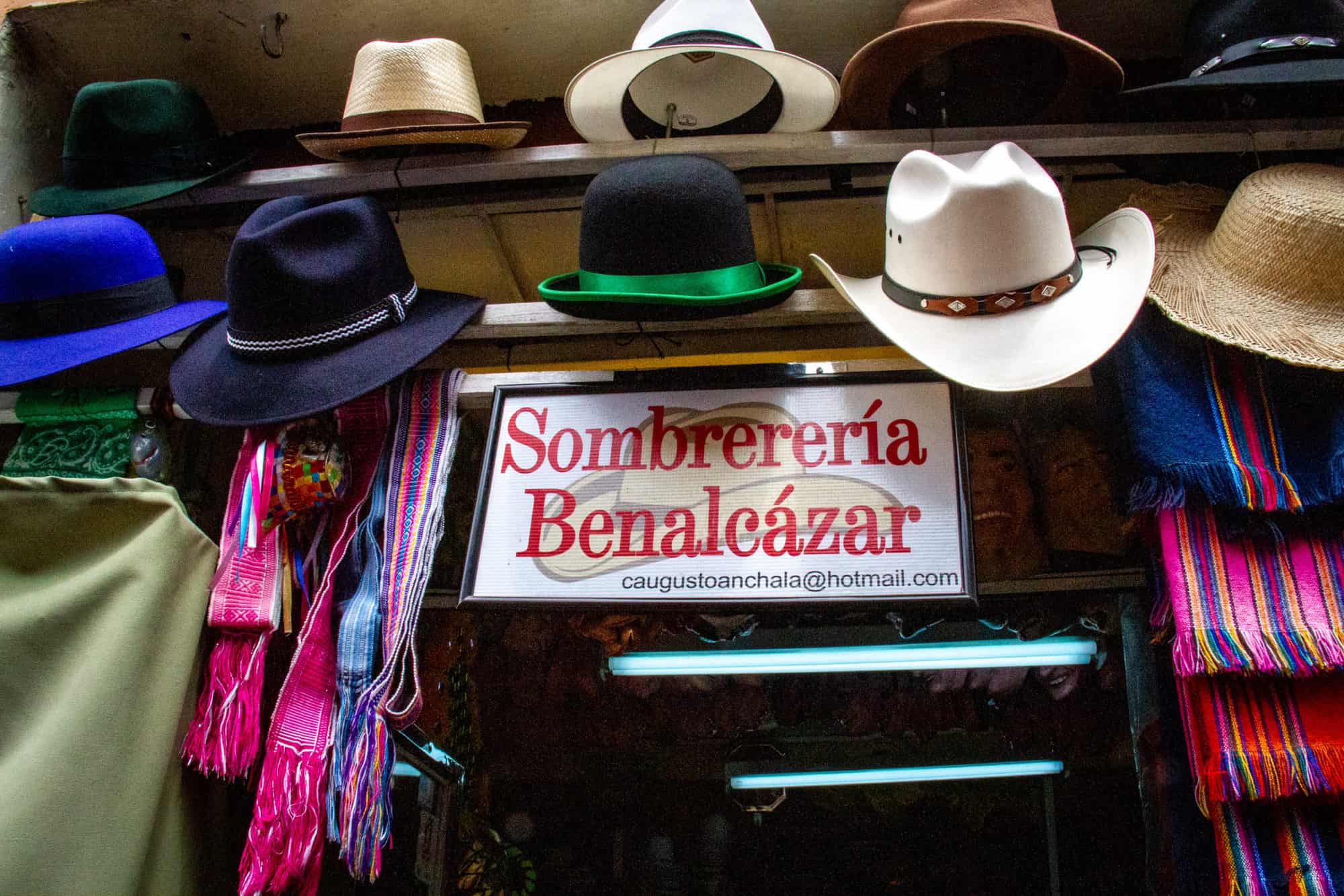 Ecuador - Quito - buying a traditional hat as a souvenir