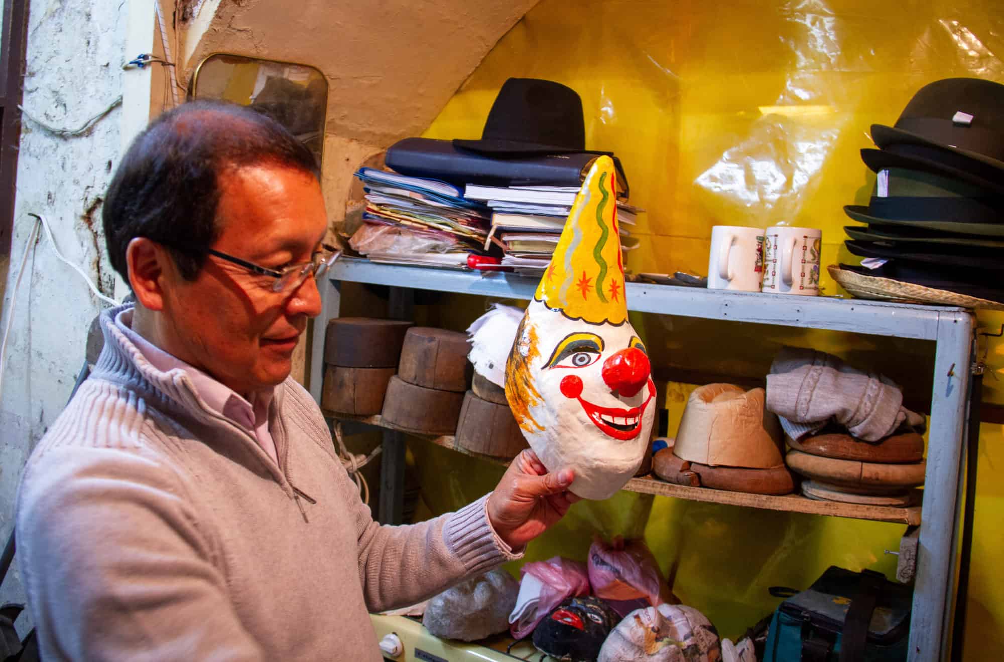 Ecuador - Quito - buying a traditional souvenirs in Ecuador - a mask