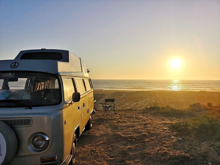 Yescapa - UK Campervan routes - VW yellow on beach