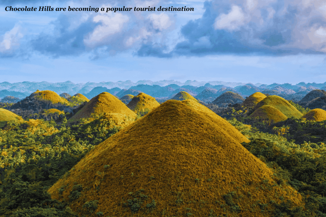 Chocolate Hills under the clouds in the Philippines - Philippines bucket list 