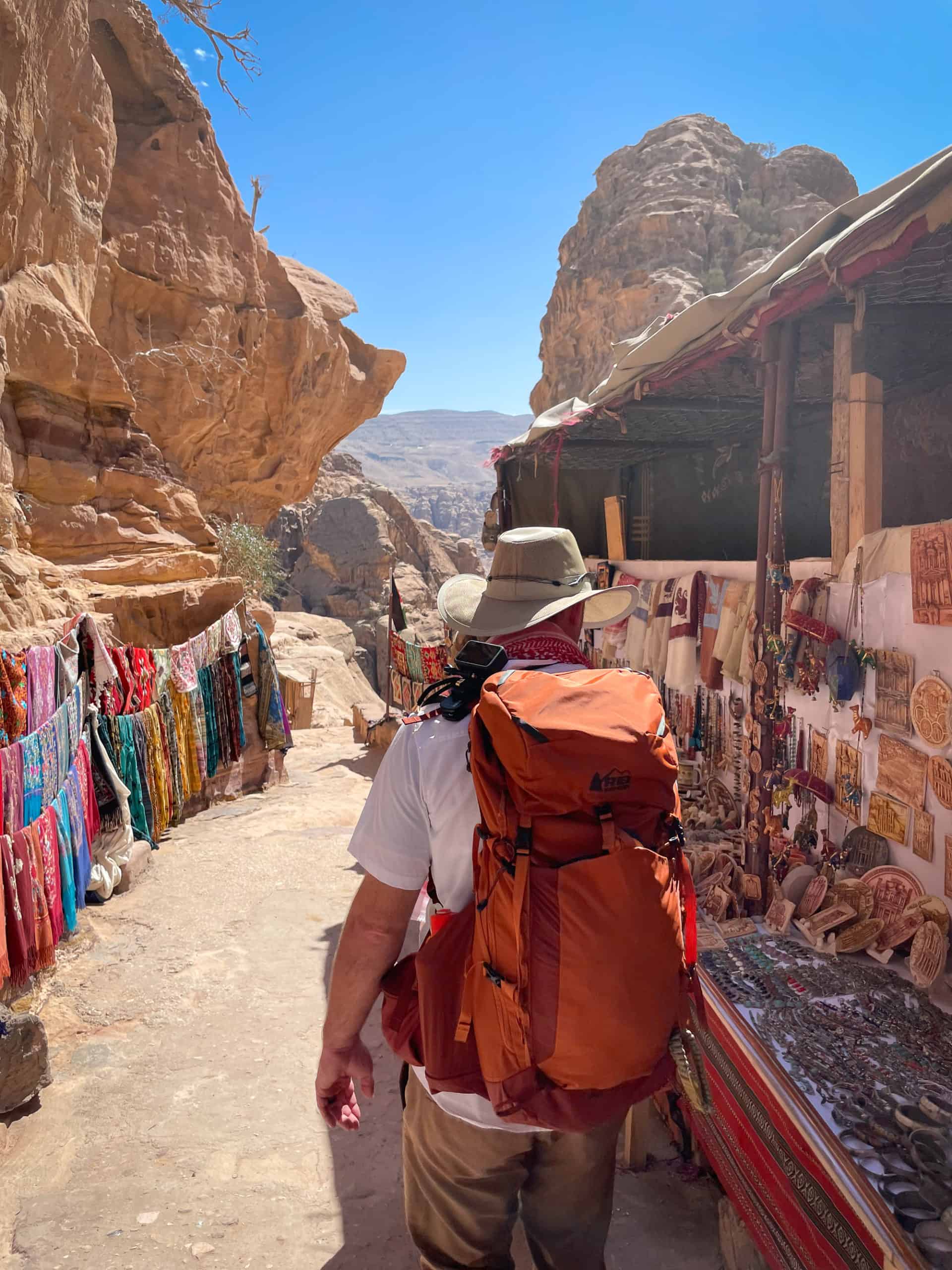 Middle East - Jordan - Petra - Souvenir Shopping - Man in Indiana Jones Hat - Divergent Travelers