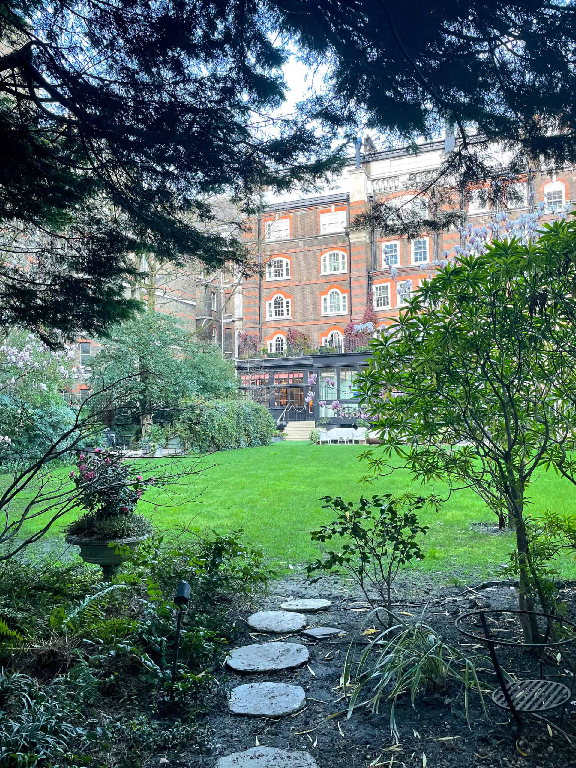 UK - England - London - The Goring Hotel Belgravia walking through the garden via stepping stones