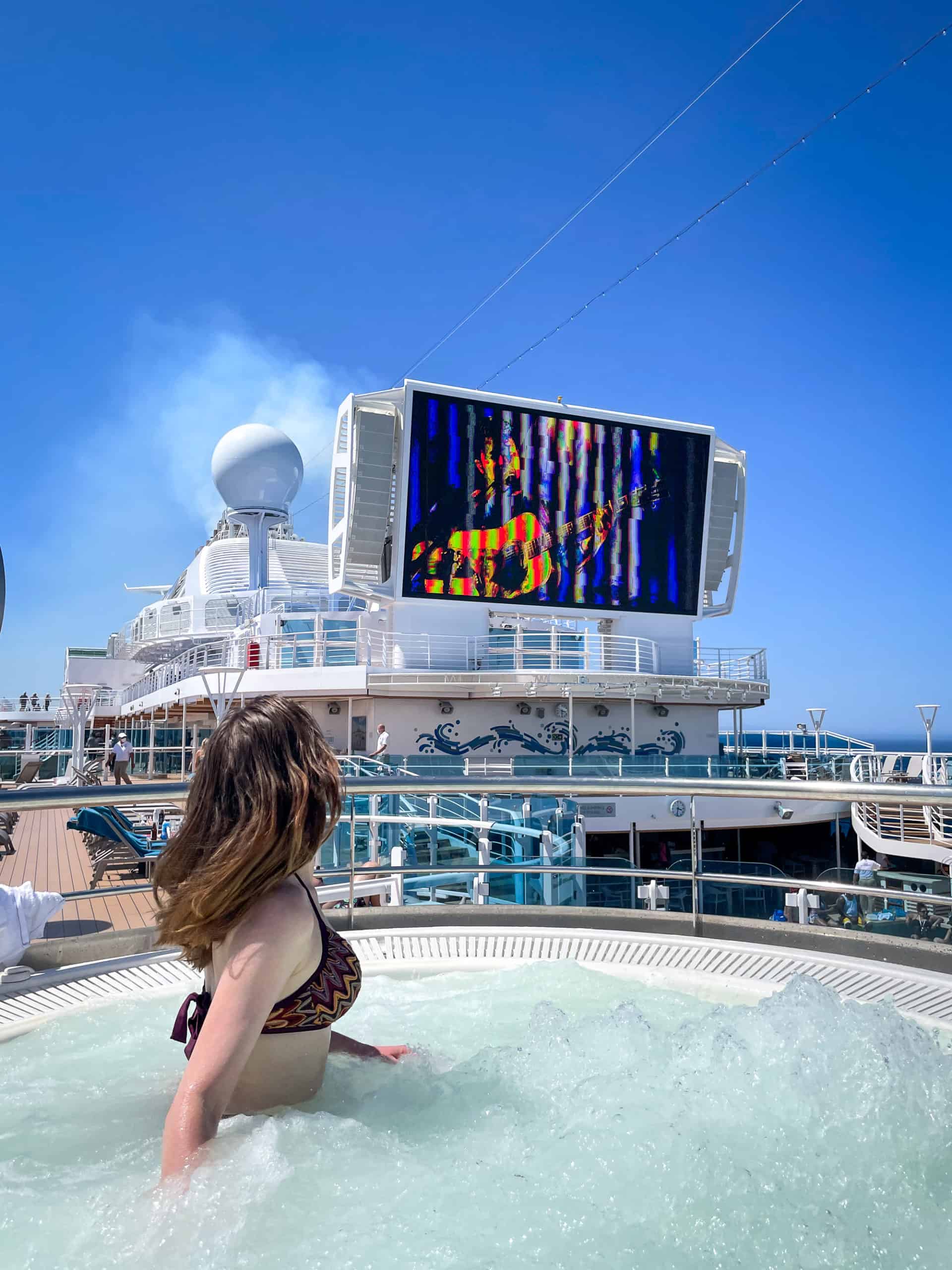 Discovery Princess Cruise Ship - Sabina in the jacuzzi looking at the big screen on the top deck
