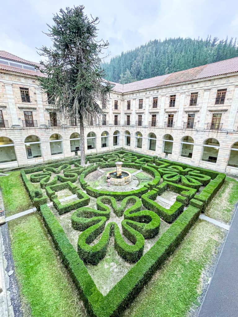 Spain - Asturias - Cangas del Narcea monastery hotel - Abigail King in maze gardens