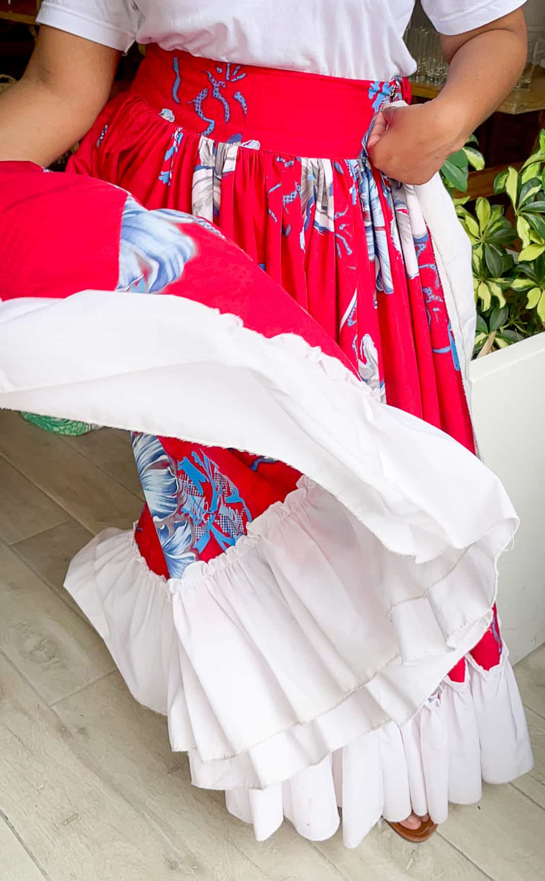 A woman swirls her skirt during a traditional performance of the Sega dance in Mauritius