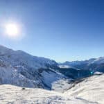 Snowy landscape mountain peak for skiers and snow mobiles