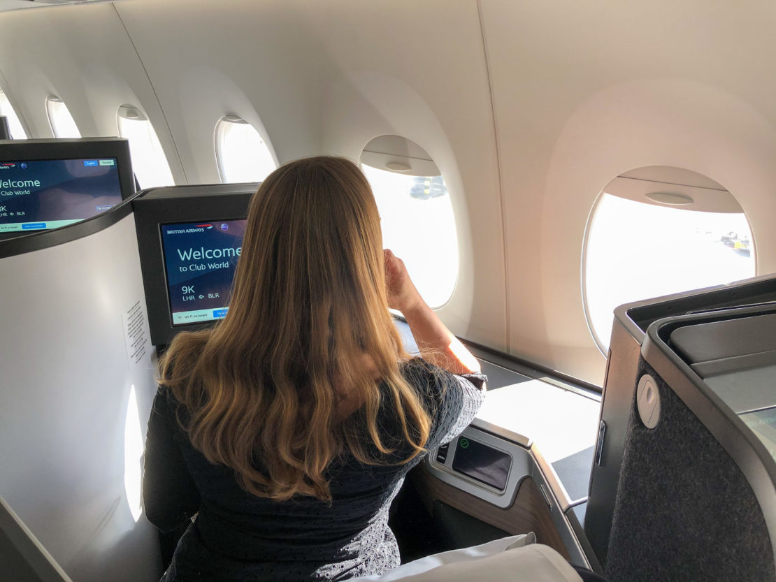 Abigail King flying business class to London