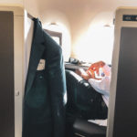 Man-in-BA-cabin-flying-business-class-from-London