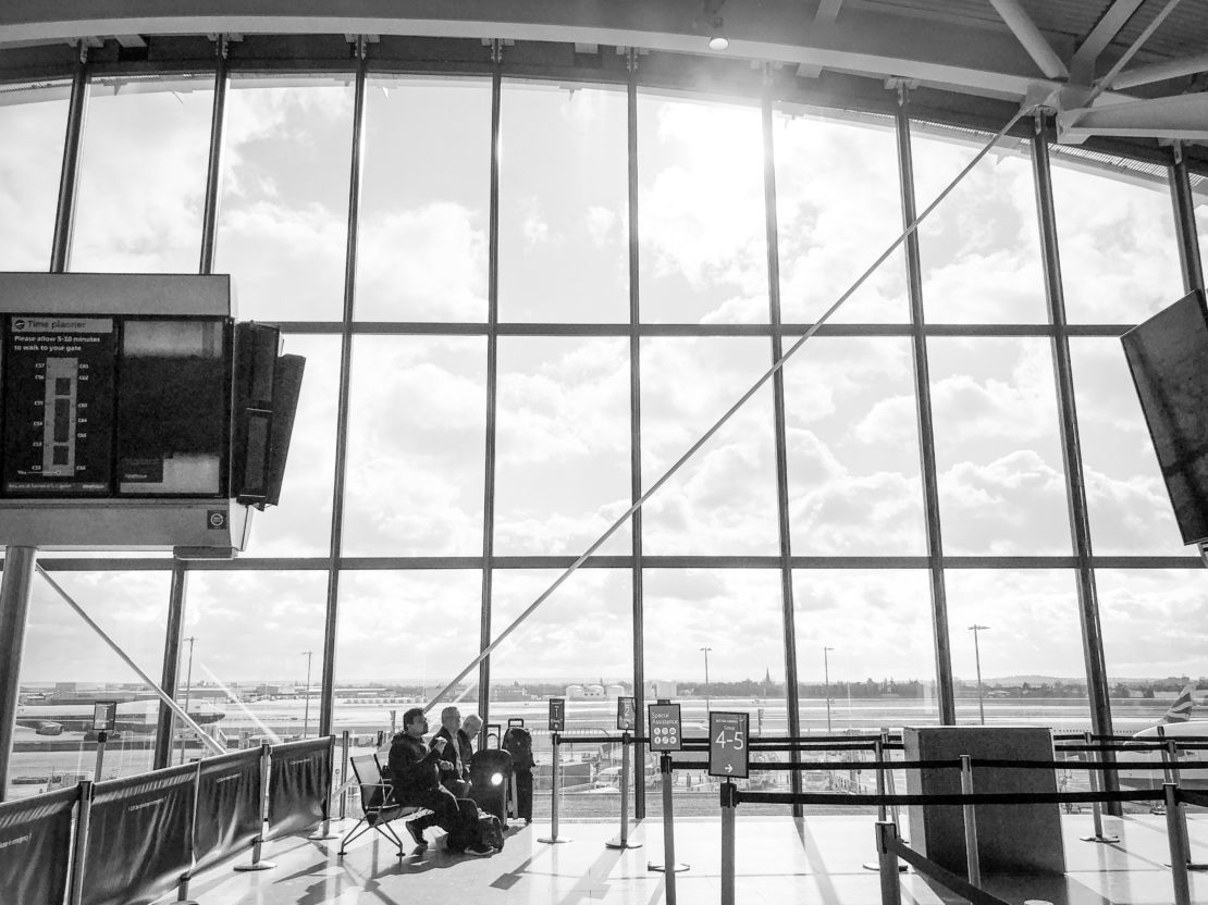London Heathrow Airport waiting area in black and white