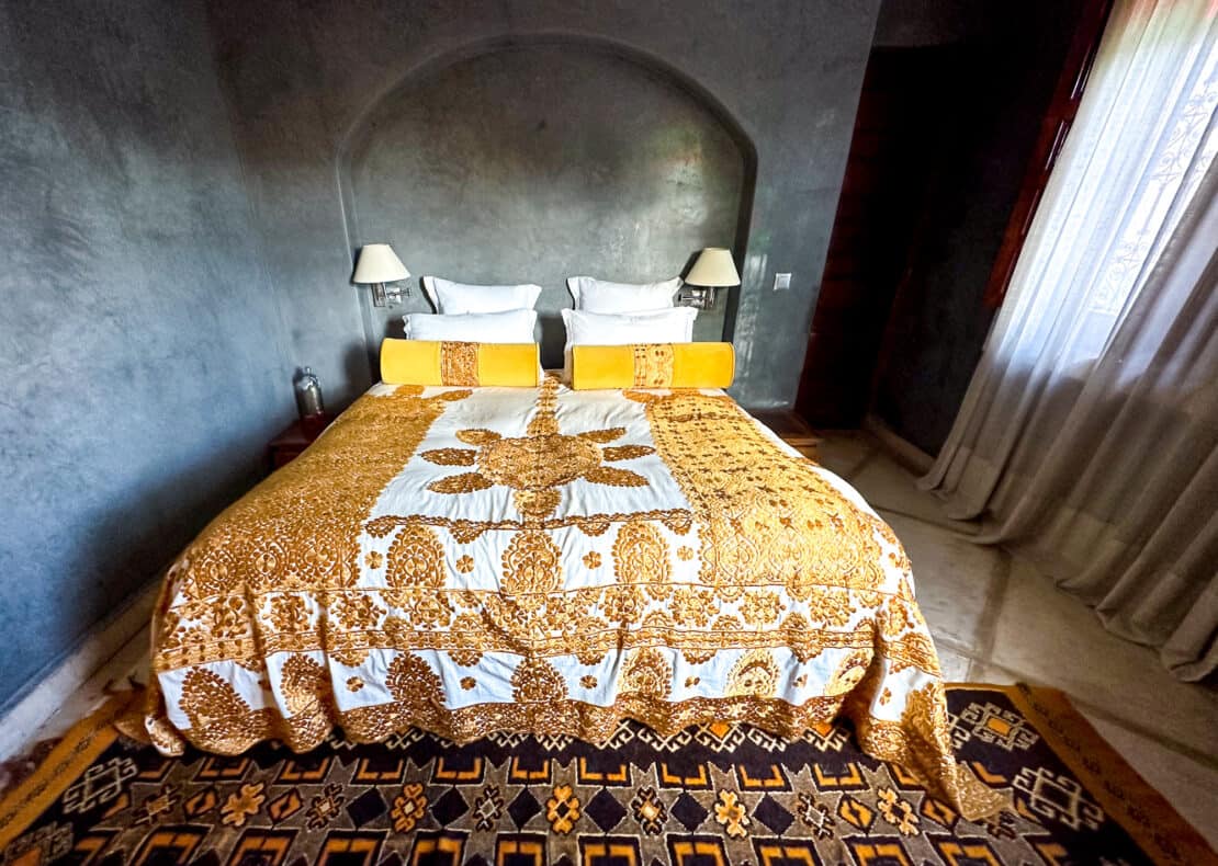 Gorgeous golden bedspread in Riad Alma in Marrakesh Morocco