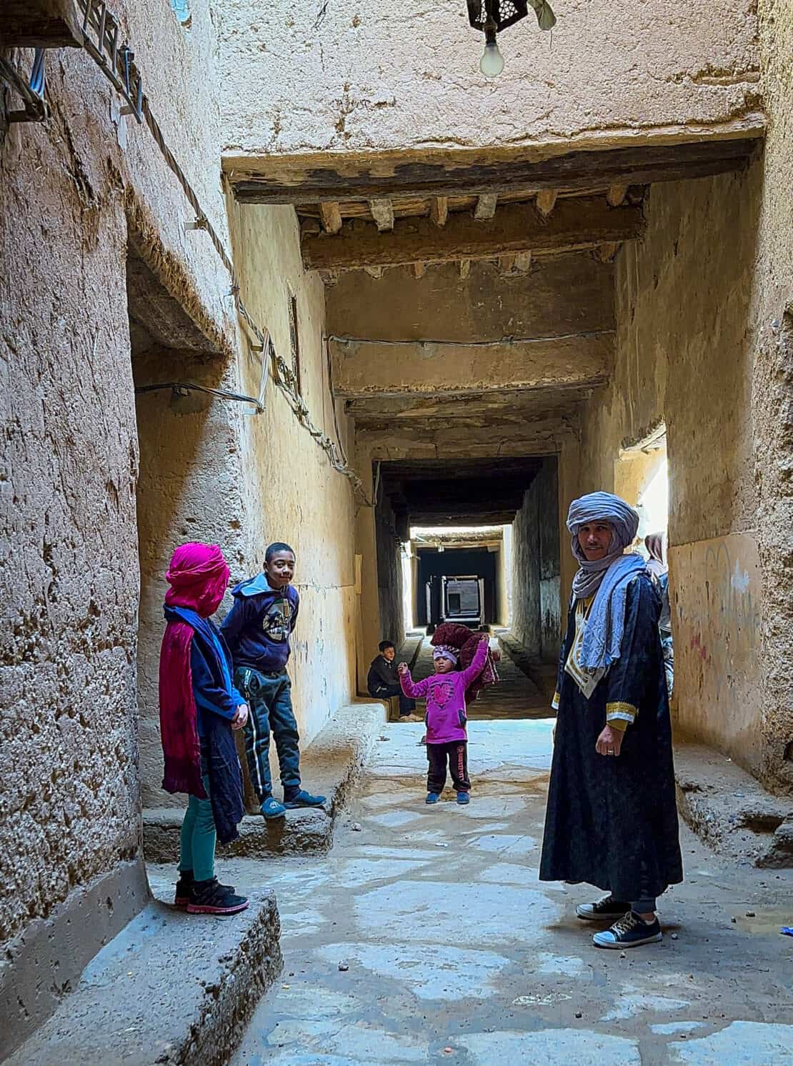 Playing with kids in Ksar el Khorbat near Tinejdad as part of a Morocco Itinerary