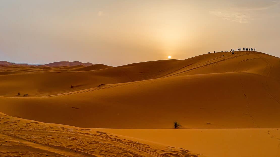 Sand dunes at sunset on a Morocco itinerary that travels to Erg Chebbi