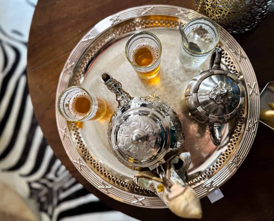 Beautiful Moroccan tea set with glasses of mint tea in Marrakech