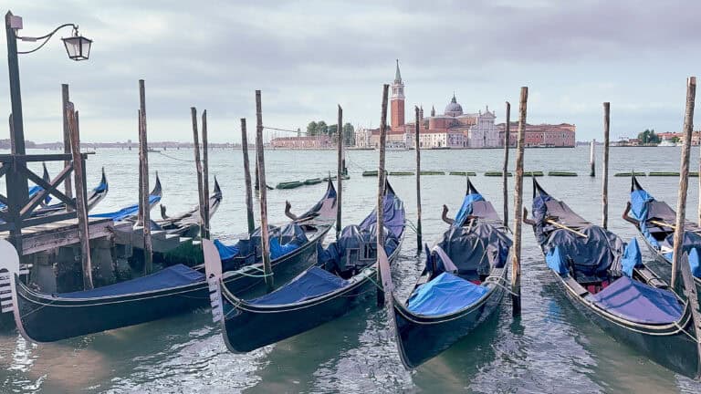 Gondolas waiting by Venice Italy