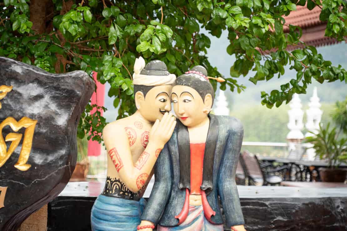 The whispering lovers outside Wat Phumin in Nan Thailand