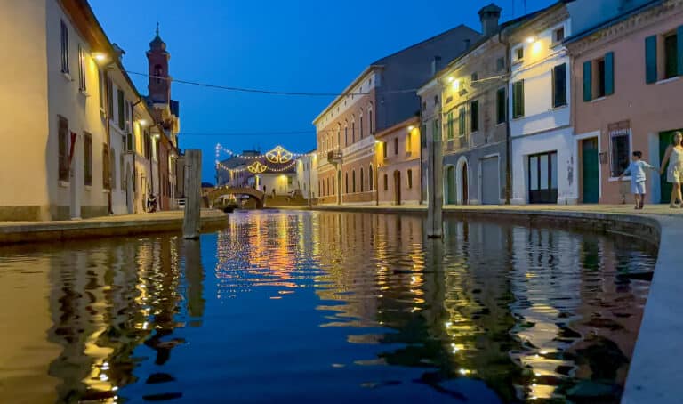Twilight reflections on the water in Comacchio Italy