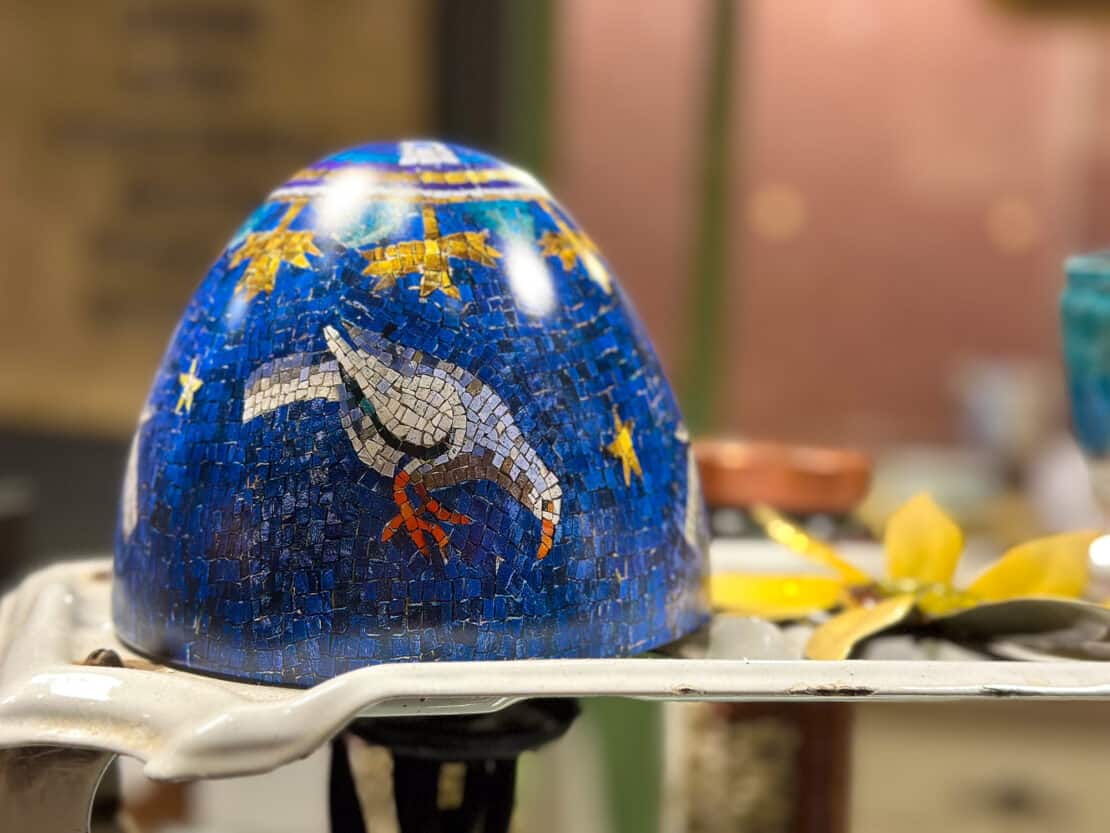 Blue mosaic egg with bird decoration in Ravenna