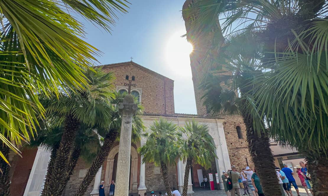 Italy - Ravenna -  Basilica di Sant'Apollinare Nuovo exterior with palm trees