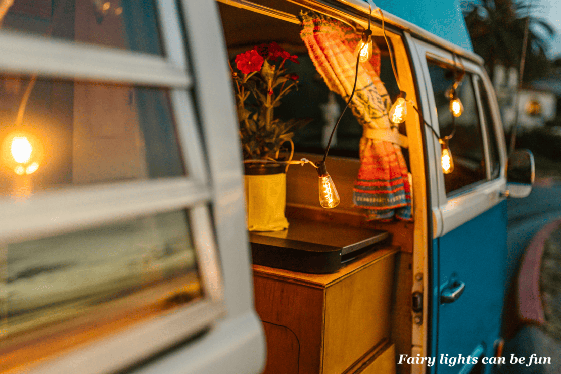 Campervan Accessories and Packing Hacks - fairy lights hanging in a campervan