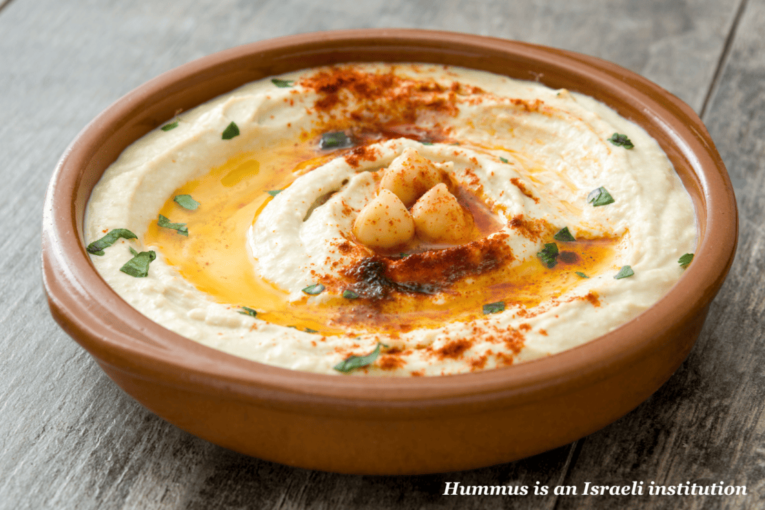 Bowl of hummus on a table 