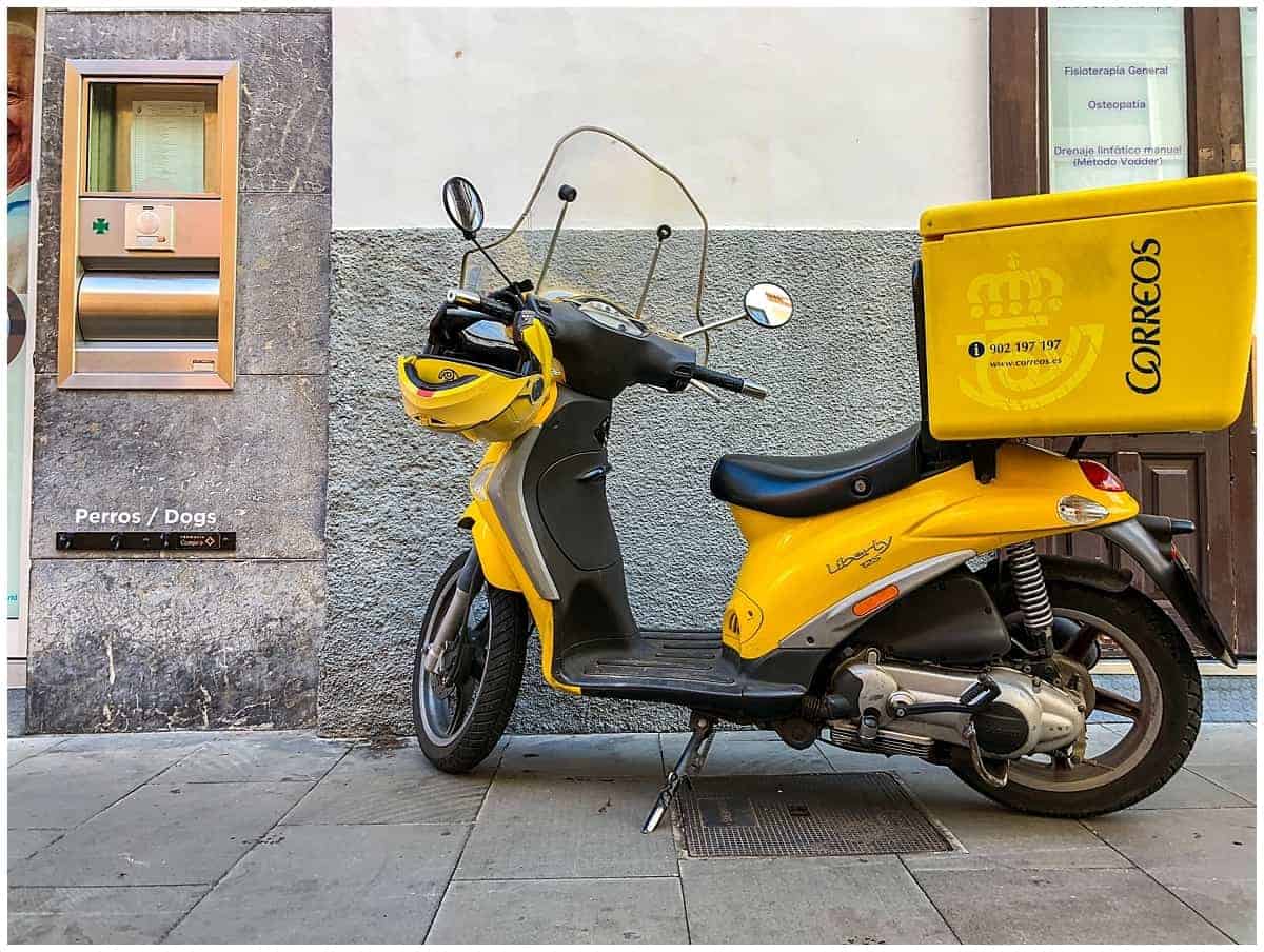Yellow scooter on the streets of Tenerife Spain 