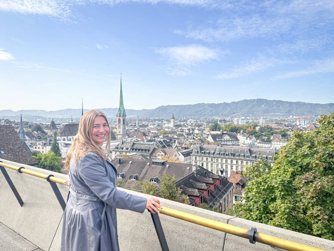 Abigail King looking at the skyline of Zurich in Chur, Switzerland