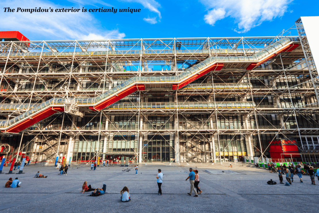 People relaxing outside of the Pompidou Centre in Paris, France