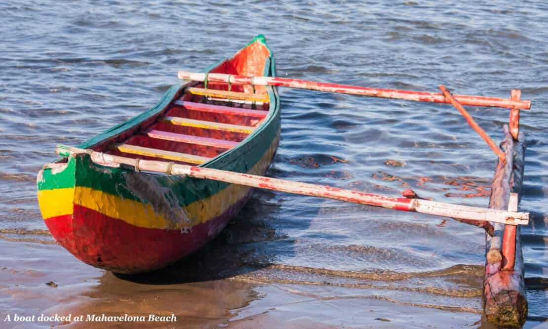 Colourful wooden row boat docked at Mahavelona Beach, Madagascar 