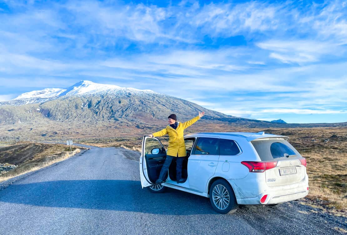 Abigail King happy in a rental car on the Snaefellsnes Peninsula in Iceland