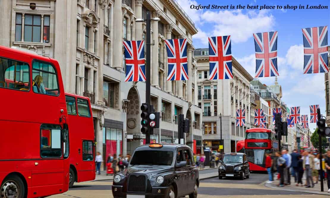 Red buses, black cabs and union jacks on Oxford Street in London 